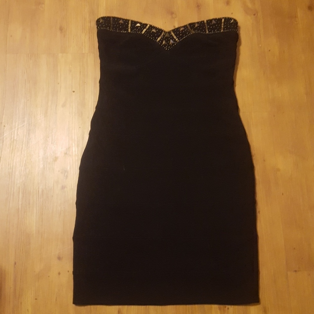 Black fitted dress.